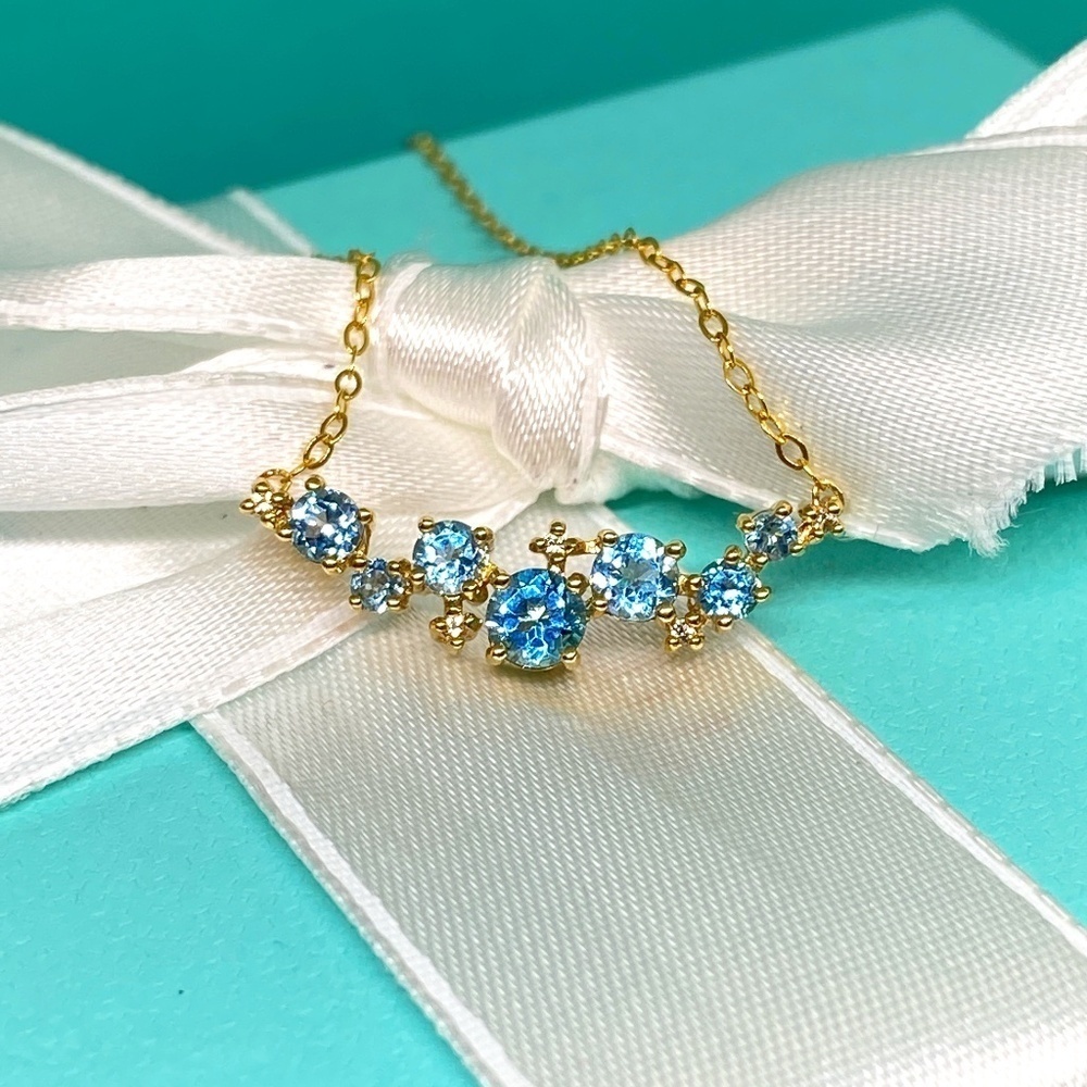 Elegant Gold and Blue Gemstone Necklace Set In A 10kt Chain